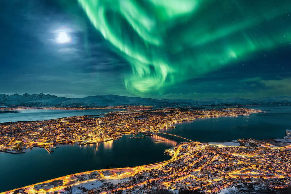Auroras boreales y mercados navideños acompañada